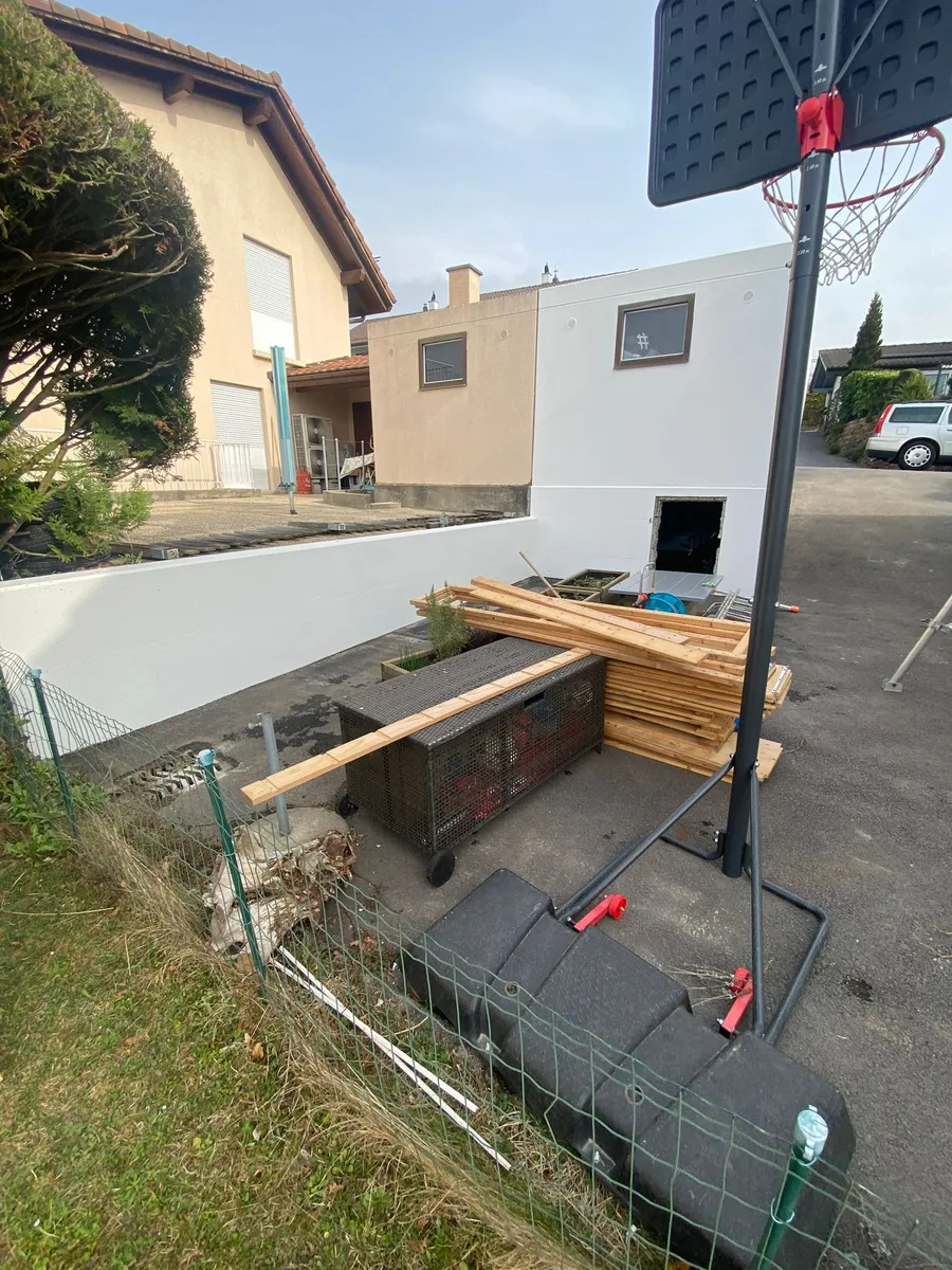 Travaux de peinture extérieure sur façade, Corseaux